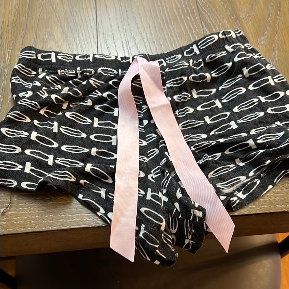 Black and White Logo Shorts with Pink Ribbon